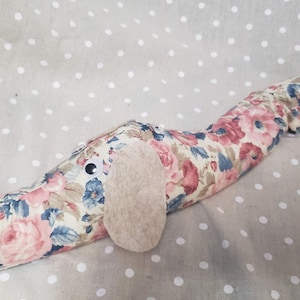 Dachshund draft stopper; draught excluder; Dog light blocker; pre filled; made of vintage peach and blue roses fabric on a light background