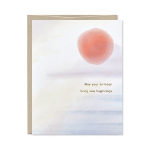 May include: A watercolor birthday card with a pink circle and the text "May your birthday bring new beginnings".