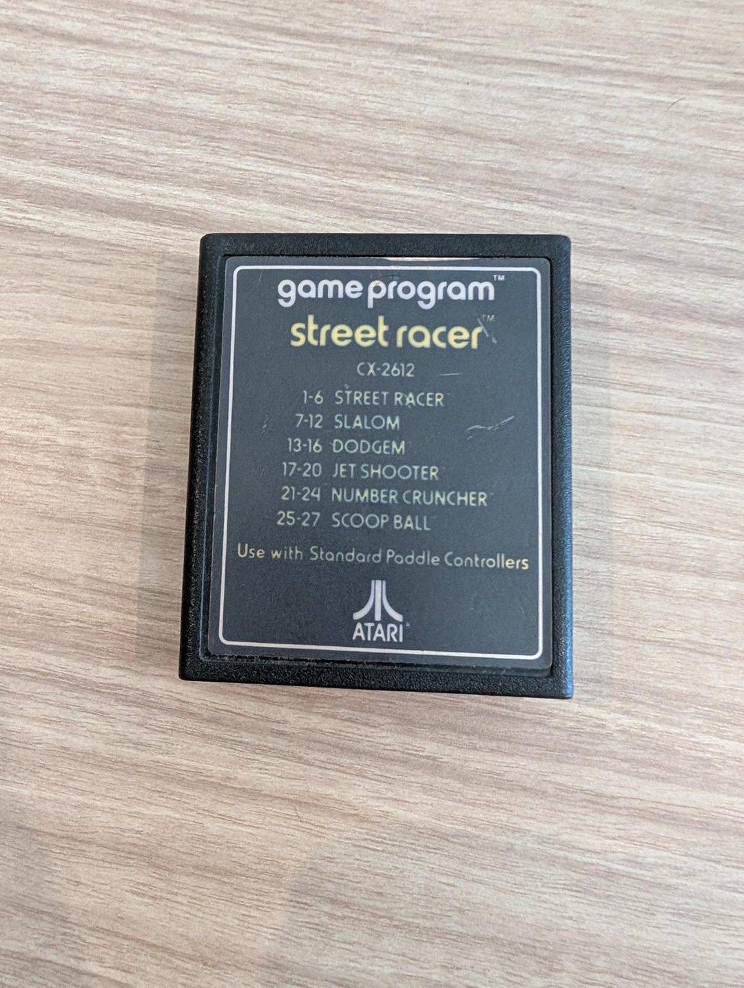 This ATARI 2600 Sears Tele-Games System has a low S/N. Right