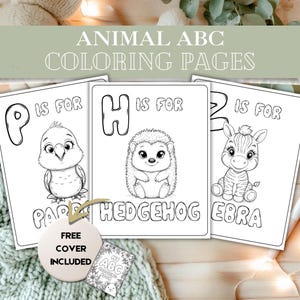 May include: Three black and white coloring pages with animal illustrations and the text "Animal ABC Coloring Pages." The pages feature a parrot, hedgehog, and zebra. A small book with the text "My ABC Coloring Book" is included.