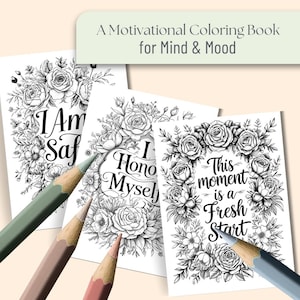 May include: A motivational coloring book for mind and mood. The image shows three coloring pages with floral designs and inspirational phrases: "I Am Safe," "I Honor Myself," and "This moment is a Fresh Start." Coloured pencils are in the foreground.