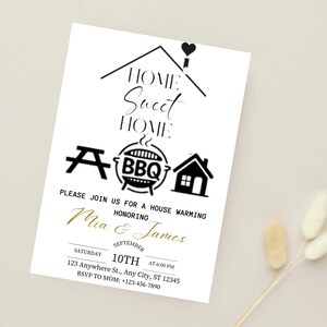 May include: White invitation card with black and gold text. The card features the words "Home Sweet Home" and BBQ graphics. It announces a housewarming for Mia & James, with date, time, and RSVP information.