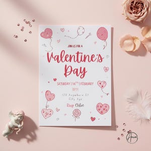 May include: A Valentine's Day invitation on a white background with pink accents. The invitation features the text "Valentine's Day" in a cursive font, along with event details and heart illustrations. A small cupid statue is in the corner.