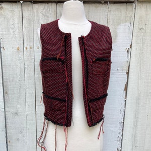 Recyled wool/acrylic sleeveless vest with raw unraveled edges and lined in silk SZ M