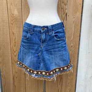 Recycled stretch patchwork denim mini skirt with double layered beaded trim and frayed edges SZ S