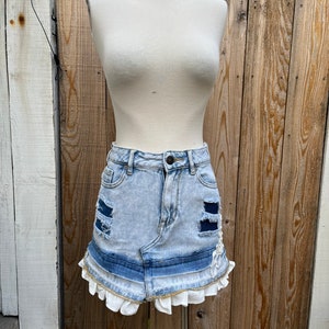 Recycled customized bleached frayed denim micro mini skirt with appliqué side and ruffled hem details SZ XS-S