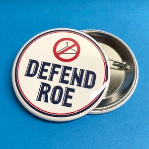 defend roe pinback button