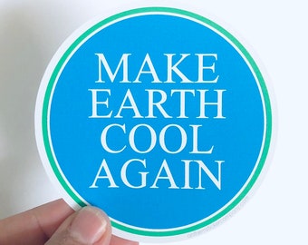 May include: A round blue sticker with a white border and green outline. The sticker says "Make Earth Cool Again".