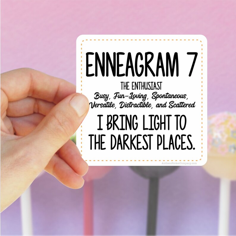 May include: White sticker with black text that reads "ENNEAGRAM 7 THE ENTHUSIAST Busy, Fun-Loving, Spontaneous, Versatile, Distractible, and Scattered I BRING LIGHT TO THE DARKEST PLACES. Atham@tickerCompany.com"
