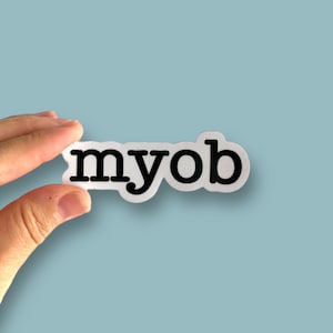 May include: White sticker with the text "myob" in black lettering.