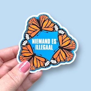 niemand es illegaal, no one is illegal, no human being is illegal, monarch butterfly sticker, migrant sticker, waterproof vinyl sticker