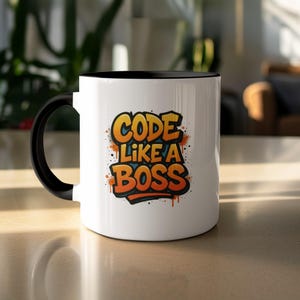 May include: White ceramic mug with a black handle and interior. The mug features the text "CODE LIKE A BOSS" in orange and yellow graffiti-style lettering with black outlines and orange drips.