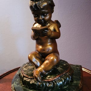 bronze, antique, little angel girl reading, trinket