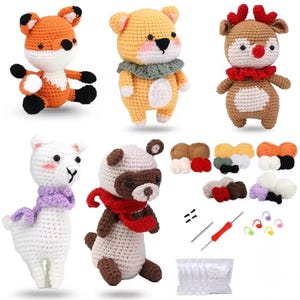 May include: A collection of handmade crochet animal toys, including a fox, bear, reindeer, llama, and panda. The toys are in various colors, with yarn and crochet tools also visible. The fox is orange and white, the bear is yellow, and the reindeer is brown.