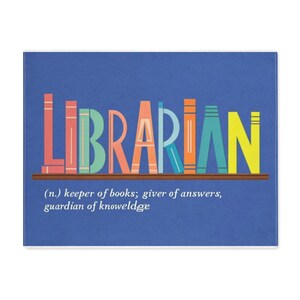 May include: A blue rectangular decorative item with the word "LIBRARIAN" in colorful letters designed to look like books. Below the word is the definition: "(n.) keeper of books; giver of answers, guardian of knoweldge."