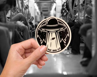 Rat Bag Lit - Glow-in-the-Dark sticker - Alien Abduction - Funny UFO Sticker, Rat Bag Merch, Weird Lit, Weird Stickers, Rat Stickers