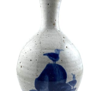 vintage studio pottery vase hand painted blue and white with speckel