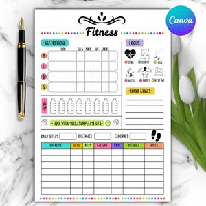 May include: A white fitness planner with colorful accents and the word "Fitness" at the top. It includes sections for nutrition, focus, daily goals, and exercise tracking. A black and gold pen is on the left.