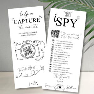 May include: Two white rectangular wedding cards with black text and line art. One card features a camera icon with a QR code, the text "help us CAPTURE the moments," and "J+M." The other card lists "i SPY" photo prompts, a QR code, and "Jessica & William" with the date 7-2-2028.