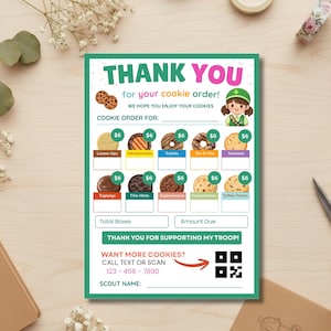 Könnte beinhalten: Ein grünes und weißes Cookie-Bestellformular mit dem Schriftzug "DANKE" in großen Buchstaben. Das Formular listet verschiedene Kekssorten, Preise und einen Bereich für die Gesamtsumme auf. Ein QR-Code und eine Telefonnummer sind ebenfalls enthalten.