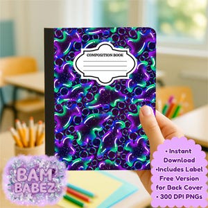 May include: A composition book with a vibrant, abstract design in shades of purple, green, and blue. The cover features the words "COMPOSITION BOOK" in a white label. The book is held in a hand.