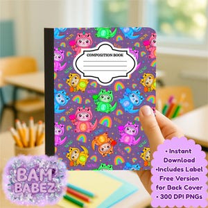 May include: A composition book with a purple cover featuring a repeating pattern of colourful dinosaur-cat hybrids, rainbows, and the word "xoxo." The book has a white label that says "Composition Book."