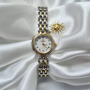 Reloj Citizen Avalon bicolor – Esfera con números romanos, caja pequeña • Como nuevo • Muñeca < 15,5 cm •