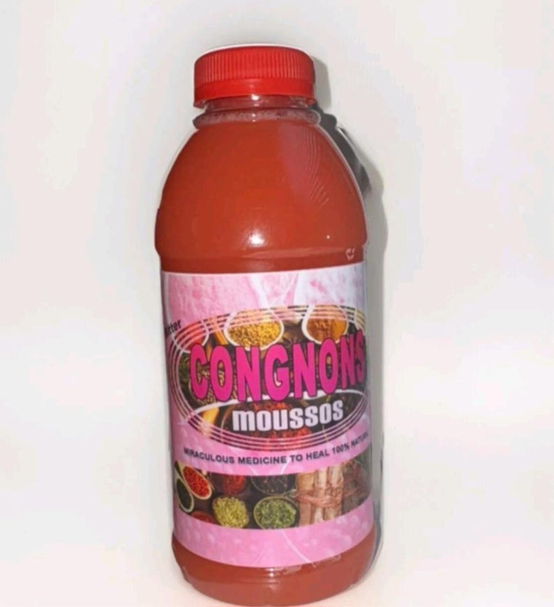 May include: A clear plastic bottle filled with a reddish liquid, topped with a red cap. The bottle has a pink label with the text "CONGNONS moussos" and other text, along with illustrations of spices. The label also states "miraculous medicine to heal 100% nature".