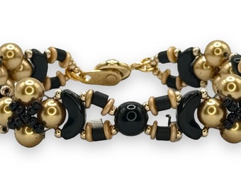 Beadweaving bracelet,gold pearls, black beads.Amy Johnson Designs B2621