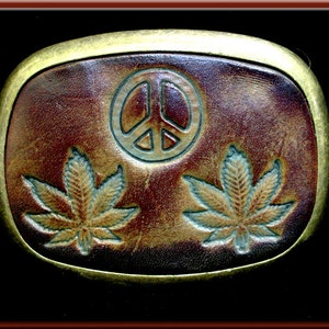 PEACE SIGN and POT Leaf Design, Handcrafted and Tooled Leather Belt Buckle • Fits up to 1 3/4&quot; Wide Belt.  2 1/2&quot; High X 3 1/4&quot; Long.