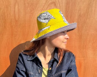 Wide brim yellow cotton sun hat with an owl motif, handmade summer hat made using upcycled fabric, reversible hat