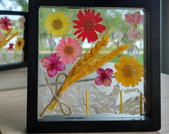 Black framed dried flower art