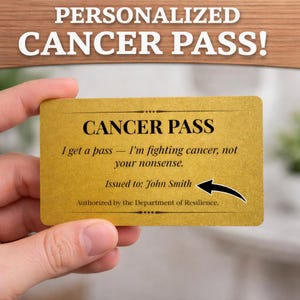 May include: A gold-colored "Cancer Pass" card with black text. The card reads "I get a pass - I'm fighting cancer, not your nonsense." The card is personalized with the name "John Smith."