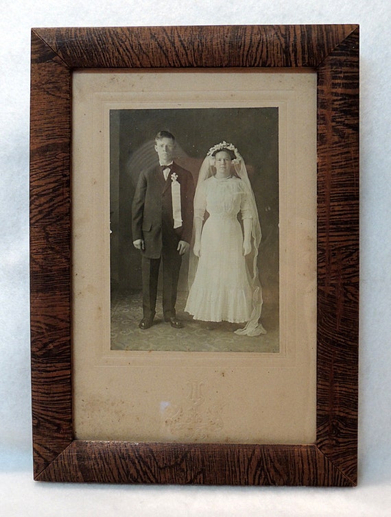 Antique photo of Bride & Groom In Original Wood Frame.. Estate Find