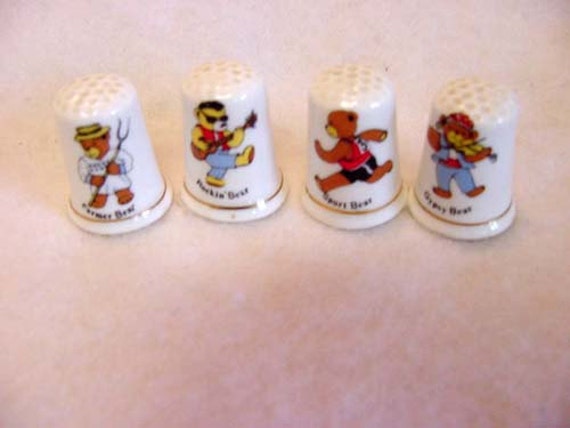 4 Vintage English Bone China Teddy Bear Thimbles.. Rocker, Farmer, Gypsy, Runner