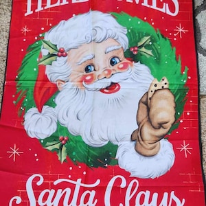 Fabric panel of santa claus to make blanket, quilts or throws, quilting fabric, or would also make a cute wall hanging.