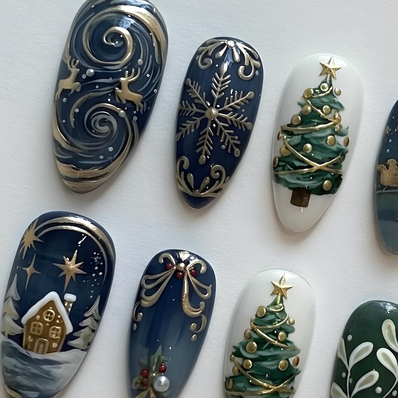 May include: A collection of painted fingernails with winter holiday designs. The nails feature various designs, including a Christmas tree, snowflakes, reindeer, and a gingerbread house. The color palette includes shades of blue, white, green, and gold.