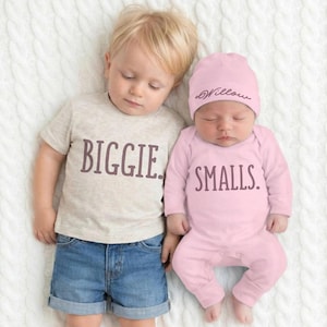 May include: A rustic wooden sign with the text "Welcome to our home" in a handwritten style. The sign is rectangular, with a distressed finish, and features a simple, inviting design. It's suitable for indoor or outdoor use.