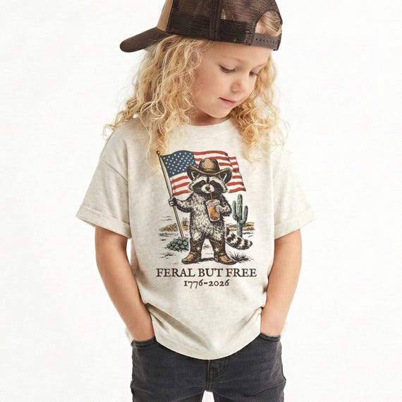 Feral But Free funny Toddler Tee, Toddler 4th of July Shirt,  Vintage Western Raccoon Cowboy TShirt, Kids American Flag Patriotic T-Shirt