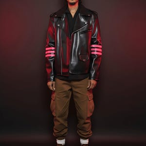 May include: A black leather jacket with pink star and stripe accents on the sleeves. The jacket is paired with brown cargo pants and brown boots. The person is wearing a black shirt.