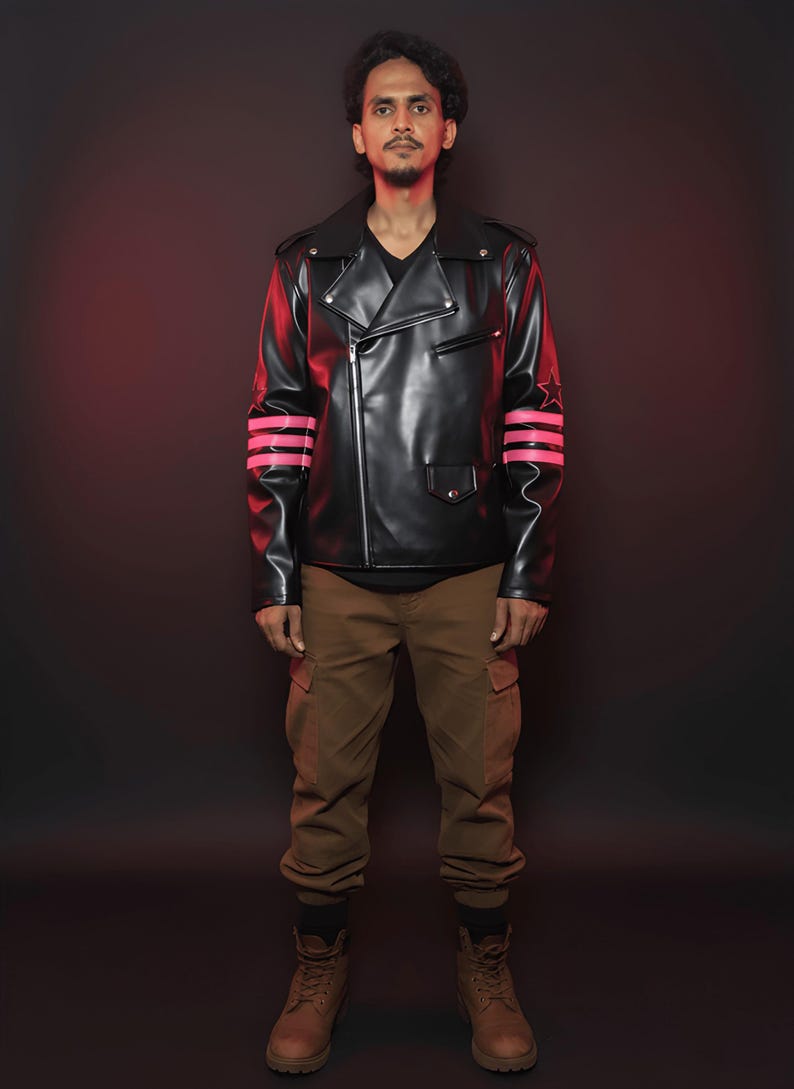 May include: Black leather jacket with a notched collar, asymmetrical zipper, and pink striped accents on the sleeves. The jacket is paired with brown cargo pants and brown boots. The background is a dark red.