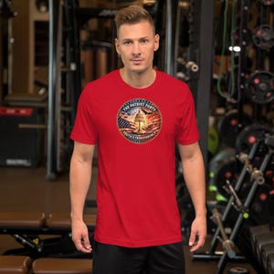 May include: Red t-shirt with a circular graphic displaying the text "The Patriot Party" and "Truth & Transparency." The graphic incorporates an American flag design and a building illustration. The shirt is made of a soft material.