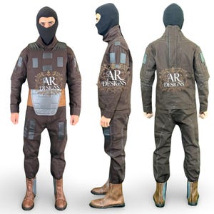 May include: A brown tactical jumpsuit with a black balaclava, featuring a chest plate and multiple pockets. The suit includes brown boots and the text "AR DESIGNS" on the front and back. The jumpsuit is designed for protection and concealment.
