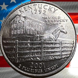 Moneda de 25 centavos de la Casa de la Moneda de EE. UU., circulada, de P&D, del año 2001, con el contorno de un caballo pura sangre.