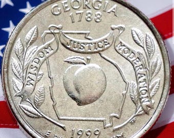 Moneda de 25 centavos de la Casa de la Moneda de EE. UU., circulada, de 1999, con el contorno del estado de Georgia.