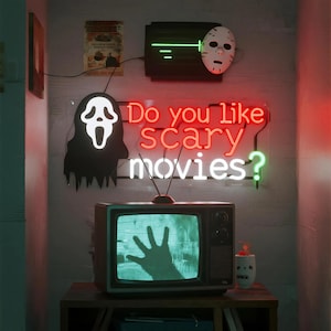 Houd je van enge films neonreclame: led muurkunst citaat horrorfilm