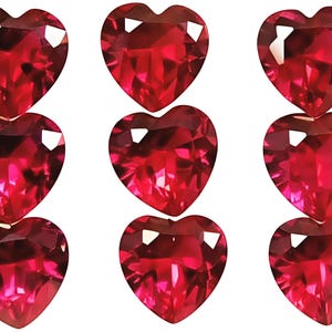 May include: Eight faceted heart-shaped red gemstones arranged in three vertical columns. Each stone features a brilliant cut with multiple reflective surfaces that create deep crimson highlights and shadows across the heart-shaped forms.