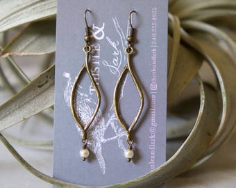 Twisted branch earrings in antique gold