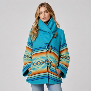 May include: A bright turquoise coat featuring a high collar and a geometric pattern in shades of orange, yellow, and dark blue. The coat has long sleeves and is secured at the front with two wooden toggle closures, creating a structured silhouette.