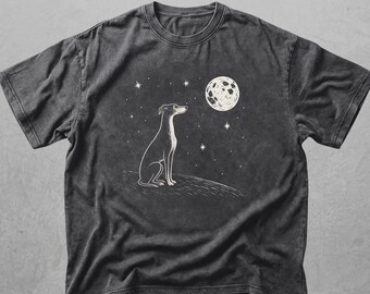 May include: A charcoal gray short-sleeve t-shirt featuring a white line art graphic of a dog sitting on a textured surface, looking up at a full moon surrounded by small stars. The fabric has a washed, vintage-style appearance with a crew neckline.